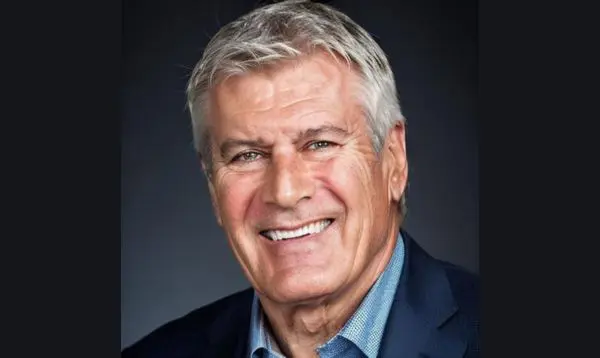 Andrew Parrillo Profile Image A man with grey hair and a blue shirt.